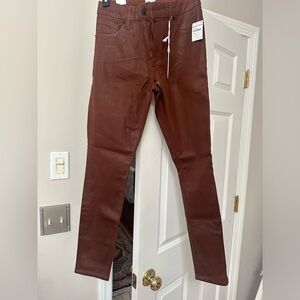 Good American brown denim. New with tags and never worn.